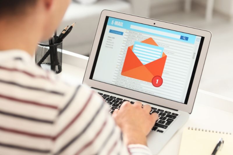 Man sending an email